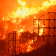 Flames burning near power lines in Sycamore Canyon near Montecito, California in December 2017.